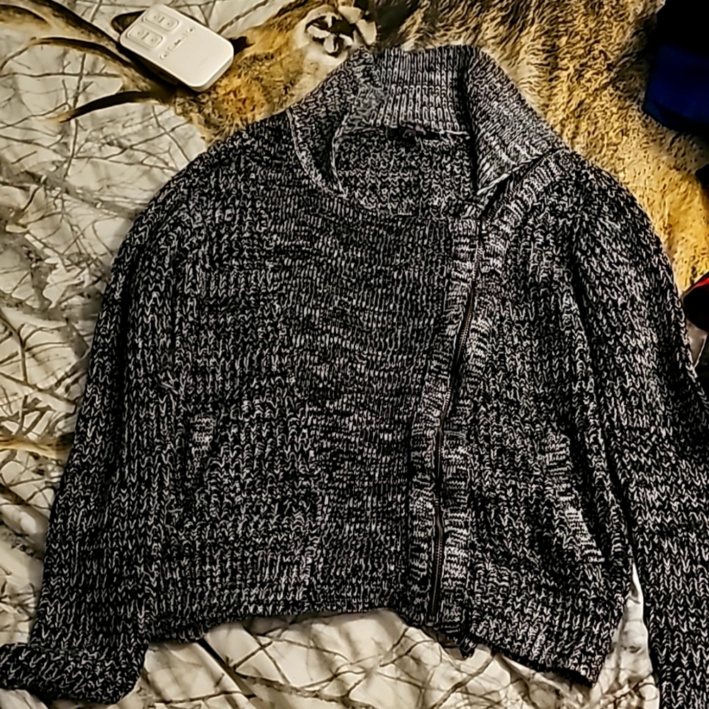 Zip up cardigan.